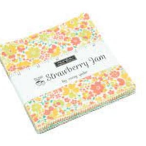 May include: A pack of 42 5-inch fabric squares featuring a floral print in shades of yellow, orange, and green. The fabric is called "Strawberry Jam" by Corey Yoder.