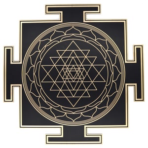 May include: A black and gold Sri Yantra, a geometric design with interlocking triangles and a central lotus flower. The design is set against a black square with gold trim, creating a striking contrast. The artwork is a symbol of spiritual significance.