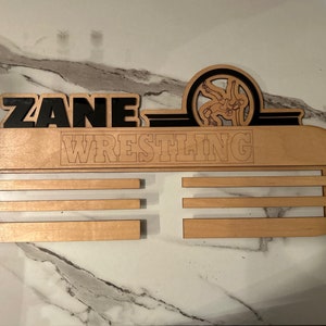 Wrestling medal holder