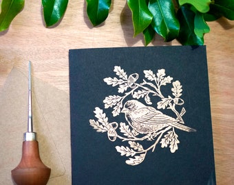 Carte de noël , linogravure oiseau or sur noir, « bird in winter 1 », valerie lenoir