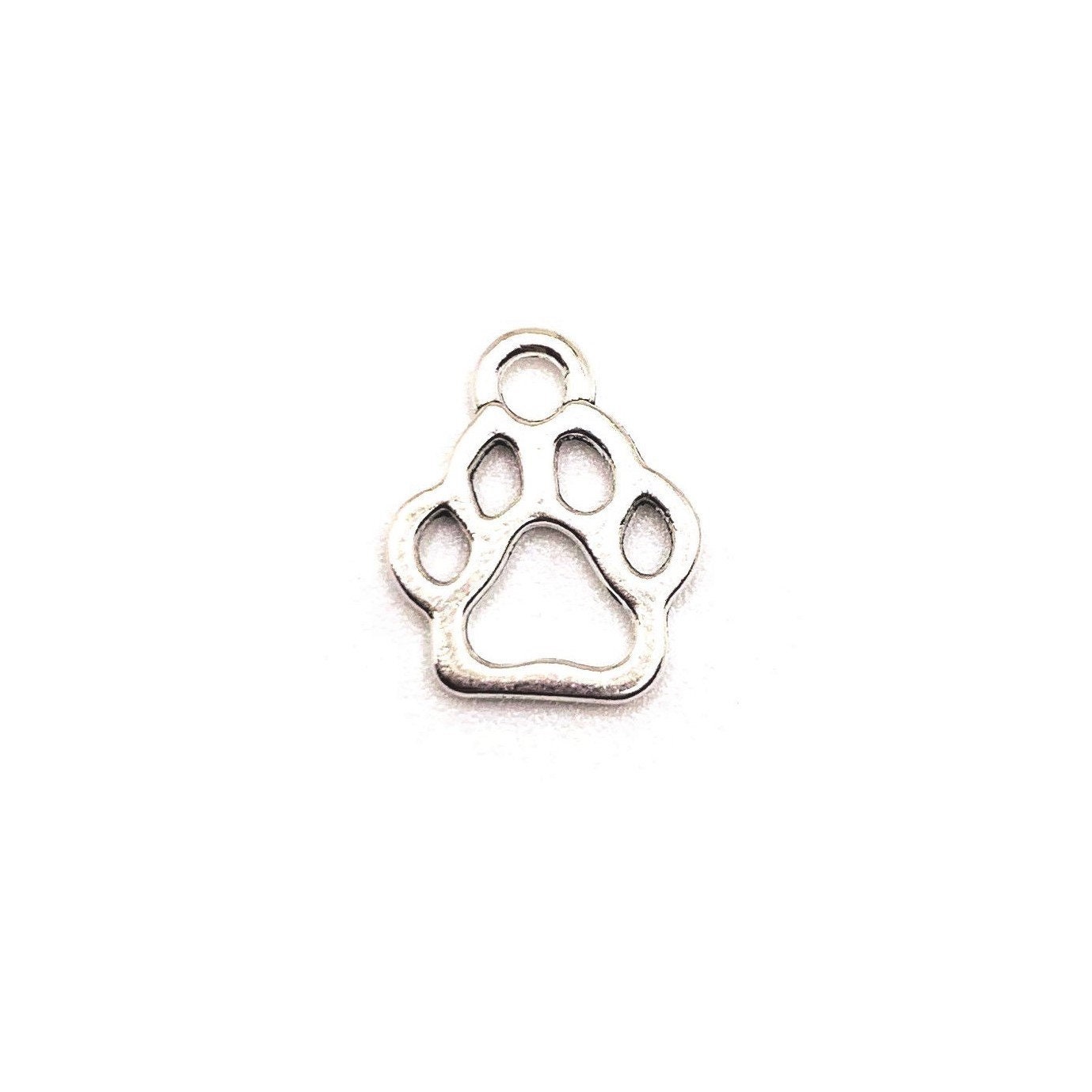 Sterling Silver Paw outline charm Sterling Silver Paw outline charm