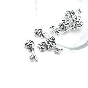 BULK 50 Small Skeleton Key Silver Tone Charms SC5437 - Etsy