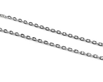 May include: A silver chain necklace with a delicate, linked design.
