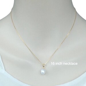 May include: A simple gold chain necklace with a single white pearl pendant. The necklace is 16 inches long.