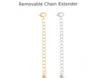 May include: Two removable chain extenders, one gold and one silver, with heart-shaped charms at the end.