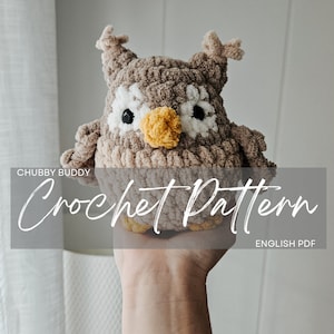 May include: Crochet pattern for a brown and white owl amigurumi toy. The owl has a yellow beak and black eyes. The pattern is available as an English PDF download. "Chubby Buddy Crochet Pattern" is written on the image.