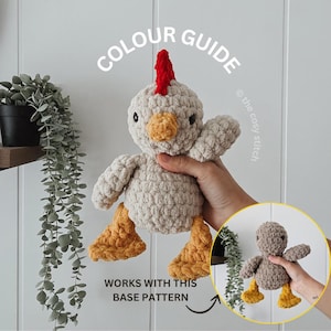 May include: A crocheted chicken toy with a red comb, yellow beak and feet, and a cream-colored body. The text "COLOUR GUIDE" and "WORKS WITH THIS BASE PATTERN" are visible.