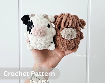 Pode incluir: Padrão de crochê para um amigurumi de vaca e um amigurumi de vaca das terras altas. O padrão está disponível em formato PDF em inglês.