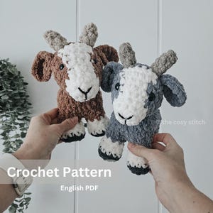 May include: Crochet pattern for two amigurumi goats, one brown and one grey, with white faces. The pattern is available in English PDF format.
