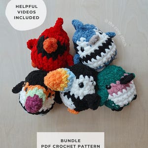May include: A bundle of five plush crochet toys including a red bird, a blue shark, a toucan, a puffin, and a green creature. The image includes text stating HELPFUL VIDEOS INCLUDED and BUNDLE PDF CROCHET PATTERN with the logo the cosy stitch.
