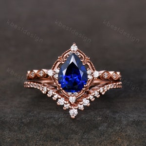 Vintage blue sapphire engagement ring set rose gold ring art deco curved stacking band pear shaped bridal set unique moissanite wedding set