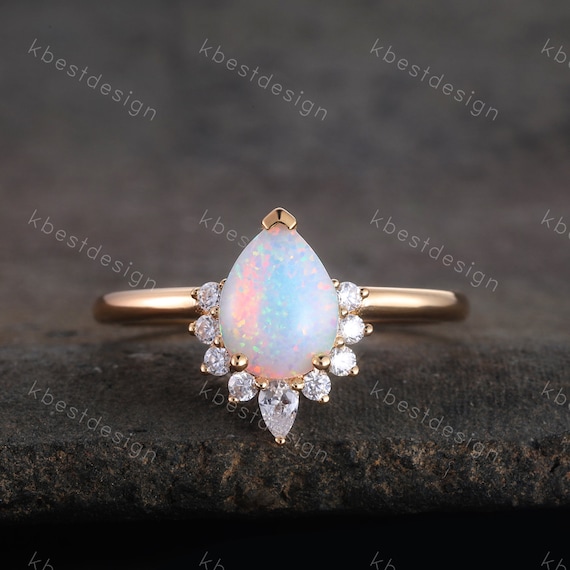 14k White Gold Cab Cut White Opal & Diamond Navette Shaped Ring | James  McHone Jewelry