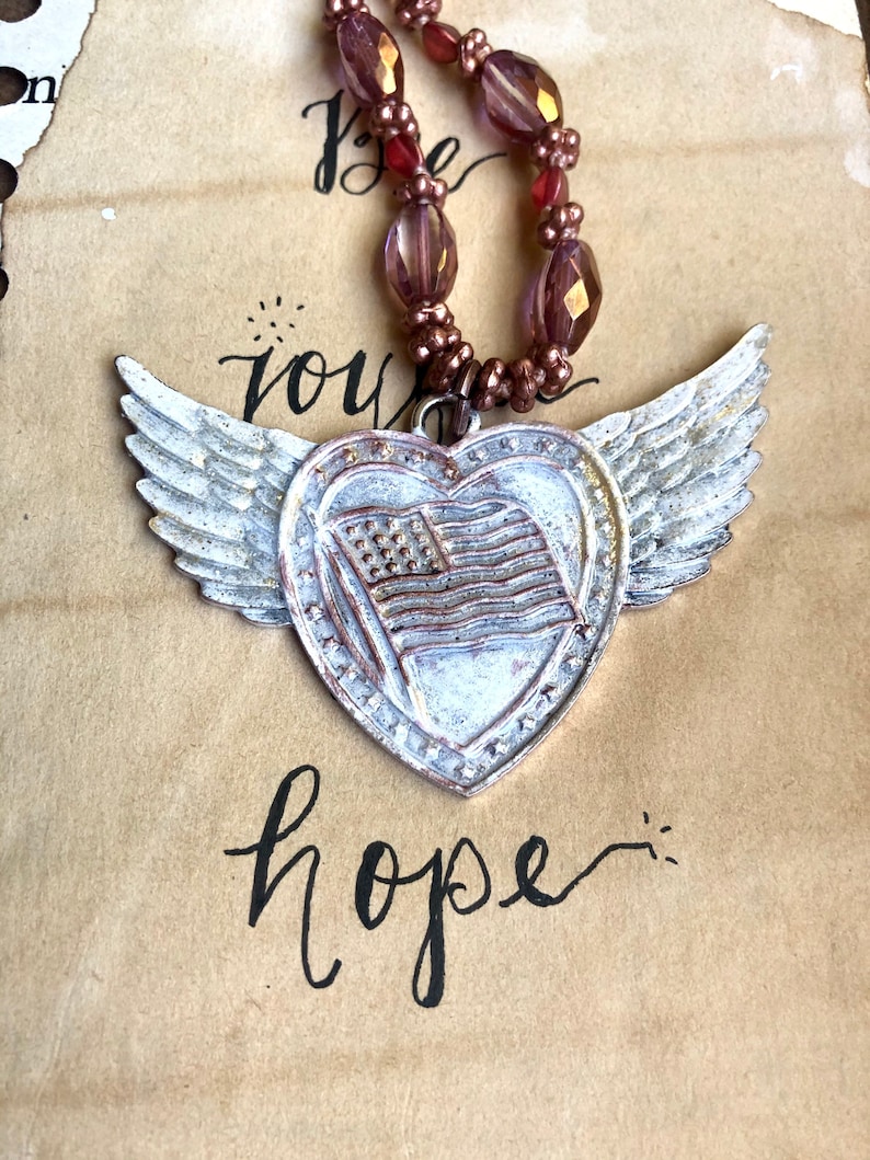 Independence Day pastel pink aesthetic Americana USA flag heart with wings painted pendant with knotted Czech glass and vintage brass chain