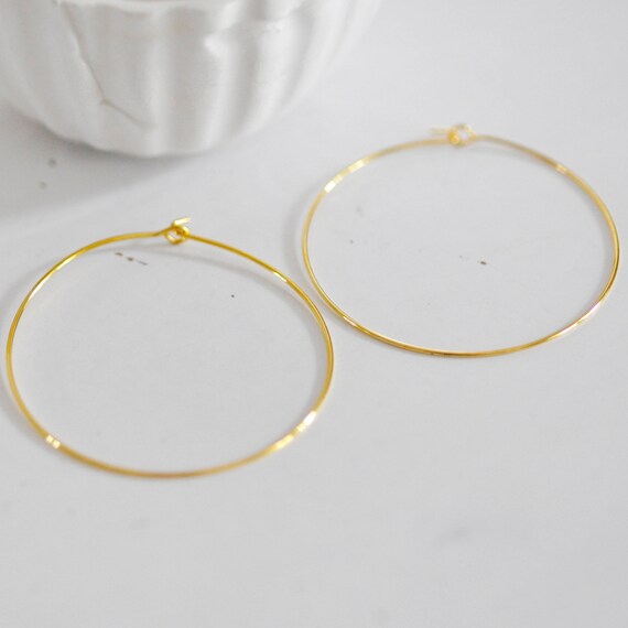 Boucles D'oreilles Créoles Marbrées Jaunes - Neuf Avec étiquettes, Plastique