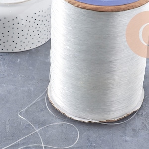 0.8mm 透明ナイロン製伸縮糸、5メートル入り (G1534)