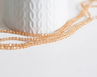 Transparent orange faceted bicone crystal beads, yellow crystal, faceted bicone, 3mm, 45 cm wire, G2600