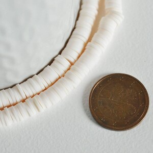 Perles polymère rose clair 4mm,x1 fil de 380 perles (G2346)