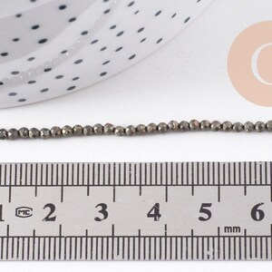 Perles rondes pyrite naturelle facettée 2mm, x1 fil de 40cm (G4046)