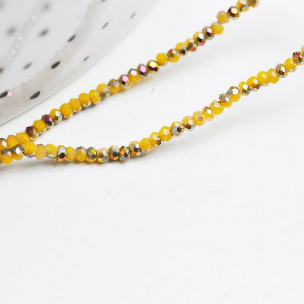 Perles toupies cristal jaune irisé, perles bijoux, perle cristal, Perle verre facette,création bijoux, fil de 26cm, 2mm G4506