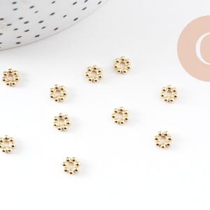 10 x 6mm 304 stainless steel flower spacer beads, 18K gold plated, x10 (G10905)