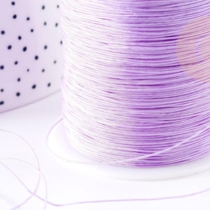 Cordon fil de jade violet clair polyester 0.5mm, cordon pour création de bijoux x1 mètre G9342