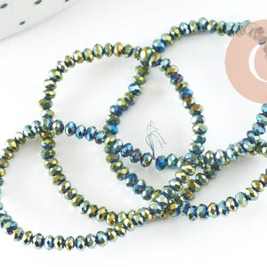 Metallic green crystal faceted spinning top beads, strand of 180 beads, 3x2mm, x1 (G5909)