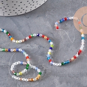 Multicolor faceted bicone crystal beads 3-3.3mm, x1 strand of 32.5cm (G11127)