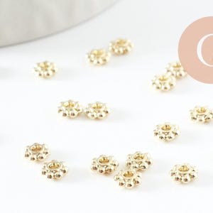 Gold-plated zamac flower spacer discs, 4mm, x20 (G9544)