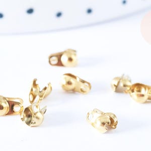 Coprinodo per catena a sfere in acciaio inossidabile 304 placcato oro con foro da 6 mm, x10 (G7318)