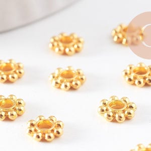 Gold zamac flower spacer beads 5mm, x50 (G10093)