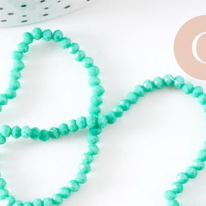 Emerald green bicone beads, jewelry beads, green crystal, faceted glass, 42cm strand, 3mm, x1 (G3908)