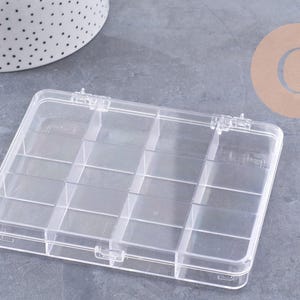 Caja rectangular de plástico transparente para guardar cuentas con 12 compartimentos, 13 cm, x1 (G10257)