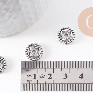 Perle intercalaire rondelle zamac argent vieilli 12mm, x10 (G0178)