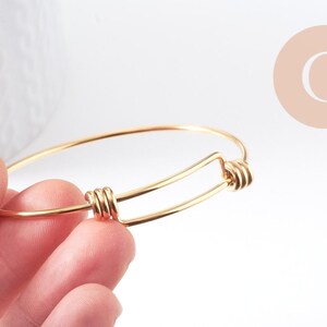 Bracelet réglable jonc lisse acier 304 inoxydable doré 63-65mm, x1 (G2915)
