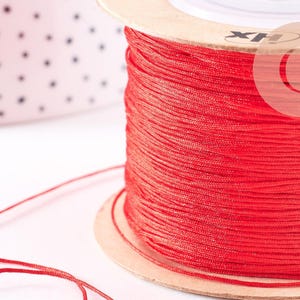 Dark red braided polyester cord 0.6mm, x1 meter (G10667)