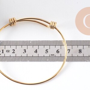 Bracelet réglable jonc lisse acier 304 inoxydable doré 63-65mm, x1 (G2915)