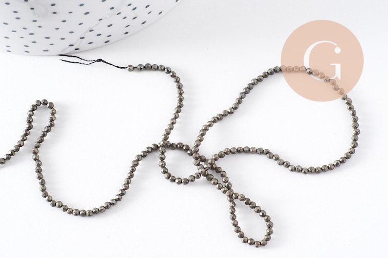 Perles rondes pyrite naturelle facettée 2mm, x1 fil de 40cm (G4046)