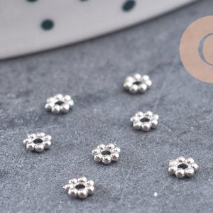 Spacer beads, flower-shaped washers, 304 stainless steel, platinum plated, 3mm, x10 (G10856)