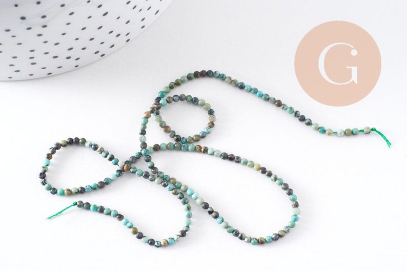 Perle Jaspe turquoise africaine naturelle 2mm,x1 fil de 39cm (G1541)
