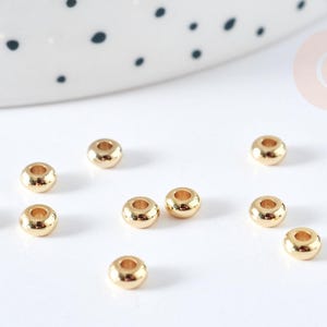 Perlina distanziatrice a ciambella in acciaio inossidabile placcato oro 304, 4x2 mm, x10 (G8480)