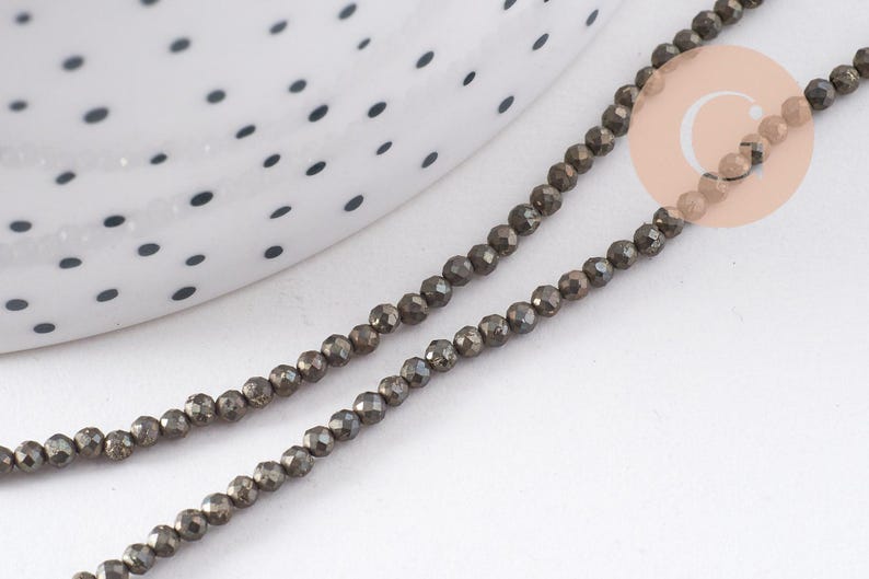 Perles rondes pyrite naturelle facettée 2mm, x1 fil de 40cm (G4046)