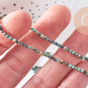 Perle Jaspe turquoise africaine naturelle 2mm,x1 fil de 39cm (G1541)