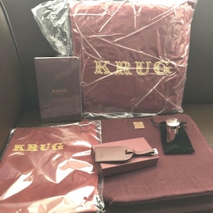 KRUG  CHAMPAGNE AFICIONADOS Goody Bag 6 Items In Krug Tote Bag Apron/Cushion/Luggage Tag/Stopper/Moleskine book