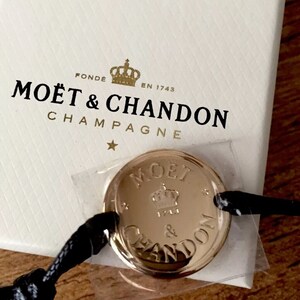 Moet Chandon Champagne Corded Gold Tone Disc Bracelet in Branded Moet ...