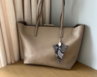 Les marques emblématiques de sacs à main de luxe - Sac a mai