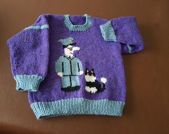 Hand knitted child's jumper, Postman Pat motif, age 1 - 2