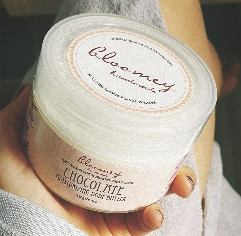 Woman holding Chocolate Body Butter Jar 250ml