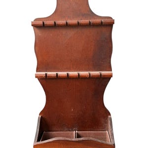 May include: A rustic wooden sign with the text "Welcome to our home" in a handwritten style. The sign features a distressed finish and a simple, inviting design, perfect for a front porch or entryway.