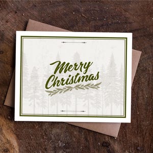 Carte de voeux joyeux Noël avec arbres