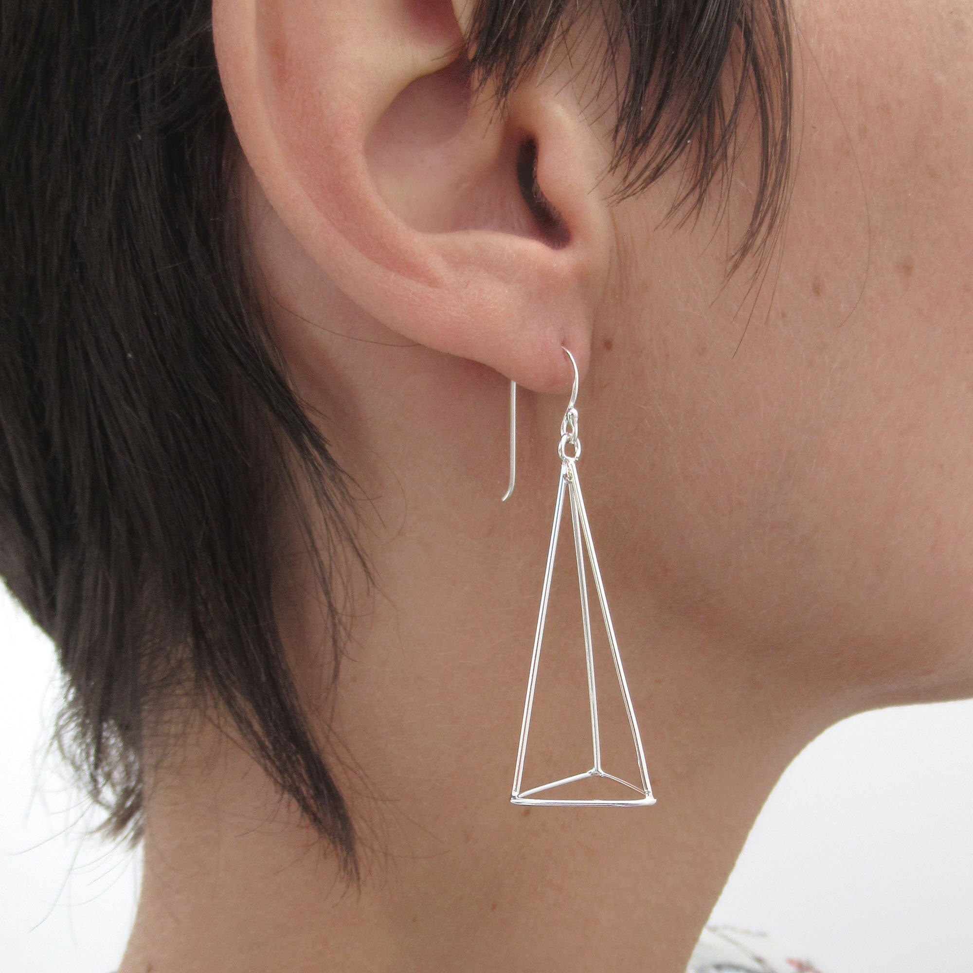 Pyramid dangle earrings deals